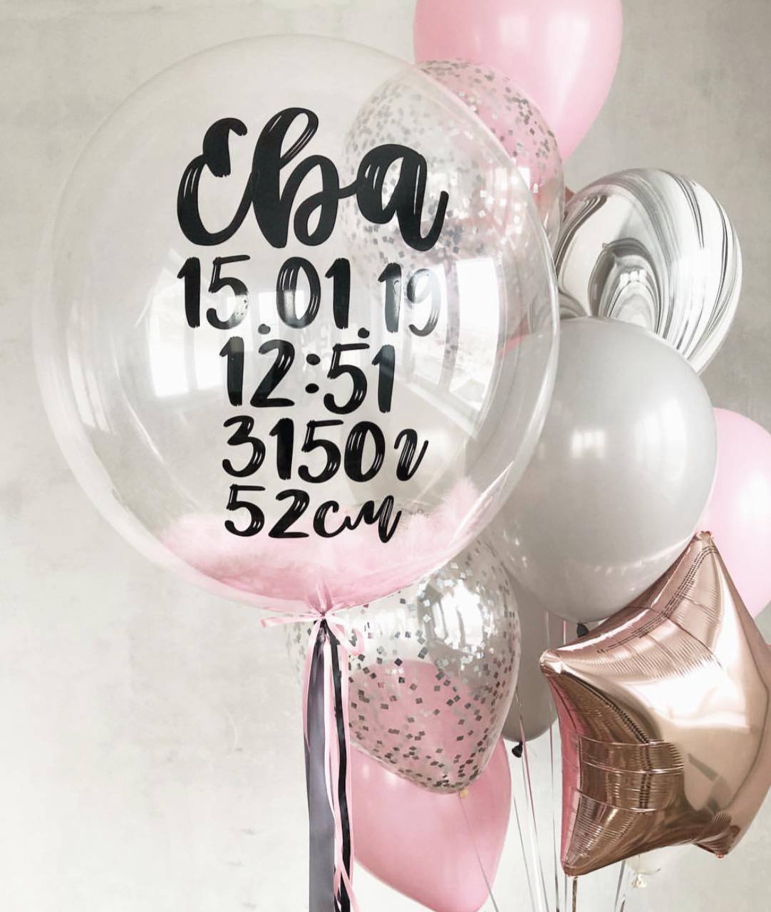 Шар с розовыми перьями