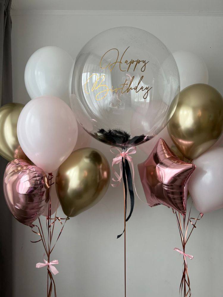 Шар с черными перьями